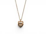 a gold necklace with a heart shaped pendant on a chain