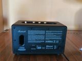 a radio sitting on top of a wooden table