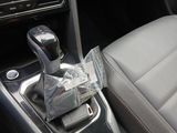 a cup holder in the center console of a car