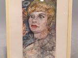 une image représentant un tableau d'une femme, dans un cadre blanc