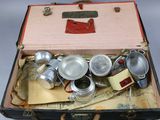 an open suitcase with a bunch of items inside of it