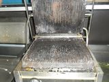 a grill that has a lot of food on it