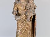 an image of a statue of a woman holding a baby