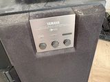 a speaker that is sitting on top of a speaker
