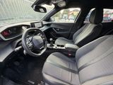 the interior of a car with a steering wheel and a dashboard