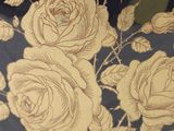 a black and gold wallpaper with gold roses on it