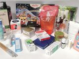 a picture of a variety of beauty products on a white surface