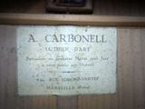 a sign on the wall that says a carbonell