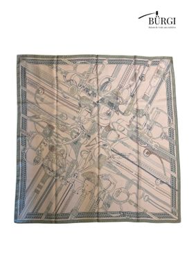 the square scarf has a picture of a man and a woman on it