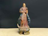 figurine of a statue of a woman holding a harp