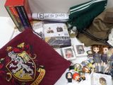 many harry potter merchandise items on the table