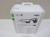 a box with a pair of headphones inside of it