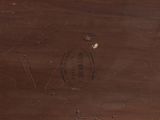 an image of a close up of a piece of wood with writing on it