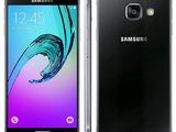 a close up of a black samsung galaxy a3 phone