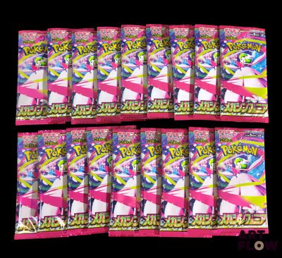 six packs of pokemon trading cards on a black background