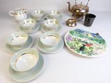 a lot of tea cups and saucers on the table