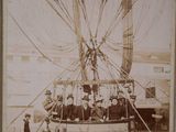 an old photo of a group of people in a hot air balloon