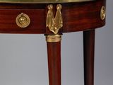 an antique mahogany and brass - plated corner cabinet with a glass door
