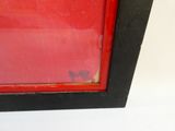 a picture of a red picture frame with a butterfly on it