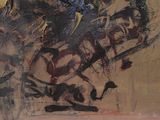 a painting of a man riding a bike on the street