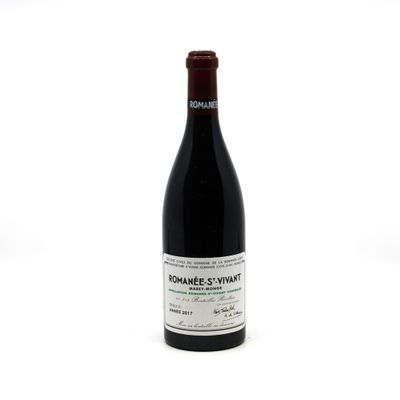 a bottle of wine that is sitting on a table