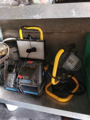 a shelf with a lot of tools on top of it