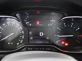 a close up of a car dashboard with a speedometer and gauges