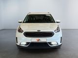 the front view of a white car in a showroom