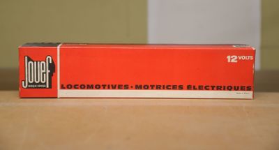 an image of a box of cigarettes sitting on top of a table