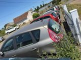 many cars parked on the side of the road