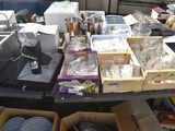 a table with many boxes of items on it