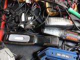 a box full of assorted electrical tools on a table