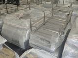 many bags of luggage sitting on the floor in a warehouse