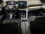 the interior of a car with a steering wheel, dashboard, and a display screen