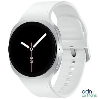 un gros plan d'une montre connectée avec un bracelet blanc