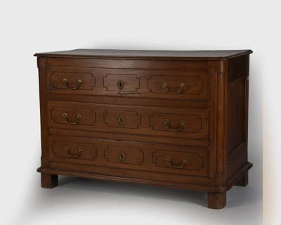an image of a chest of drawers in a room