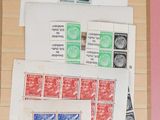 many different stamps on a piece of paper on the wall