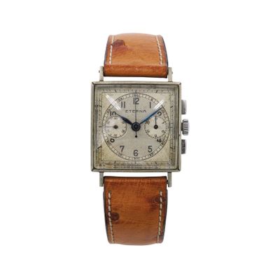 une photo d'une montre avec un bracelet en cuir marron
