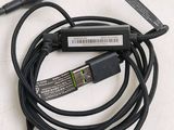 a cable that is connected to a device on a table