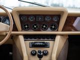 a dashboard of a car with various gauges and controls