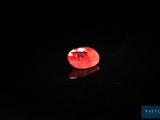 an image of an apple that is glowing in the dark
