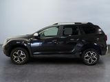 the black suv is parked in a room with a gray floor