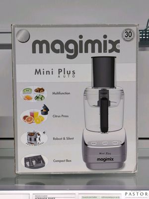 un carton contenant un robot ménager Magimix Mini Plus en vitrine