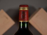 a bottle of wine that is sitting on a table