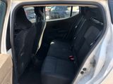 a close up of the back seats of a car in a parking lot