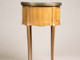 an image of a small wooden table with a marble top