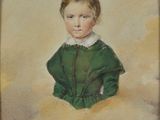 portrait of a young boy in a green dress in a wooden frame