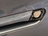 a close up of a door handle on a car