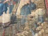 an image of a tapestry with a painting of a man and a woman on it