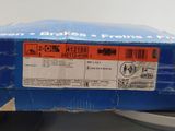 a blue box with a red and white label on it